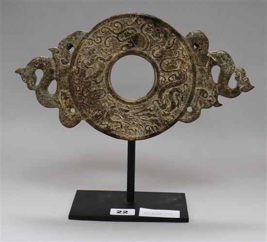 A Chinese stone bi disc height 26cm width 30cm